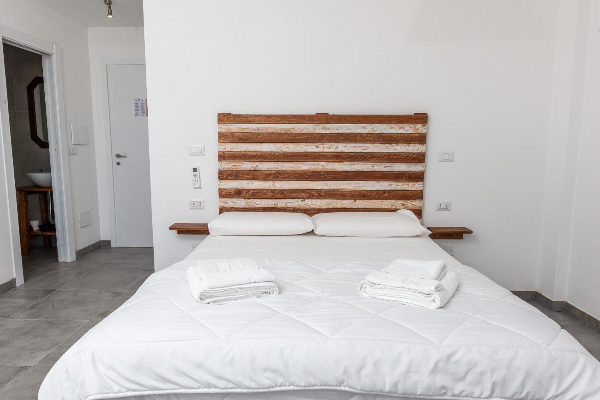 Guest House - Affittacamere Green Apartment - By Faendho Porto Torres Εξωτερικό φωτογραφία