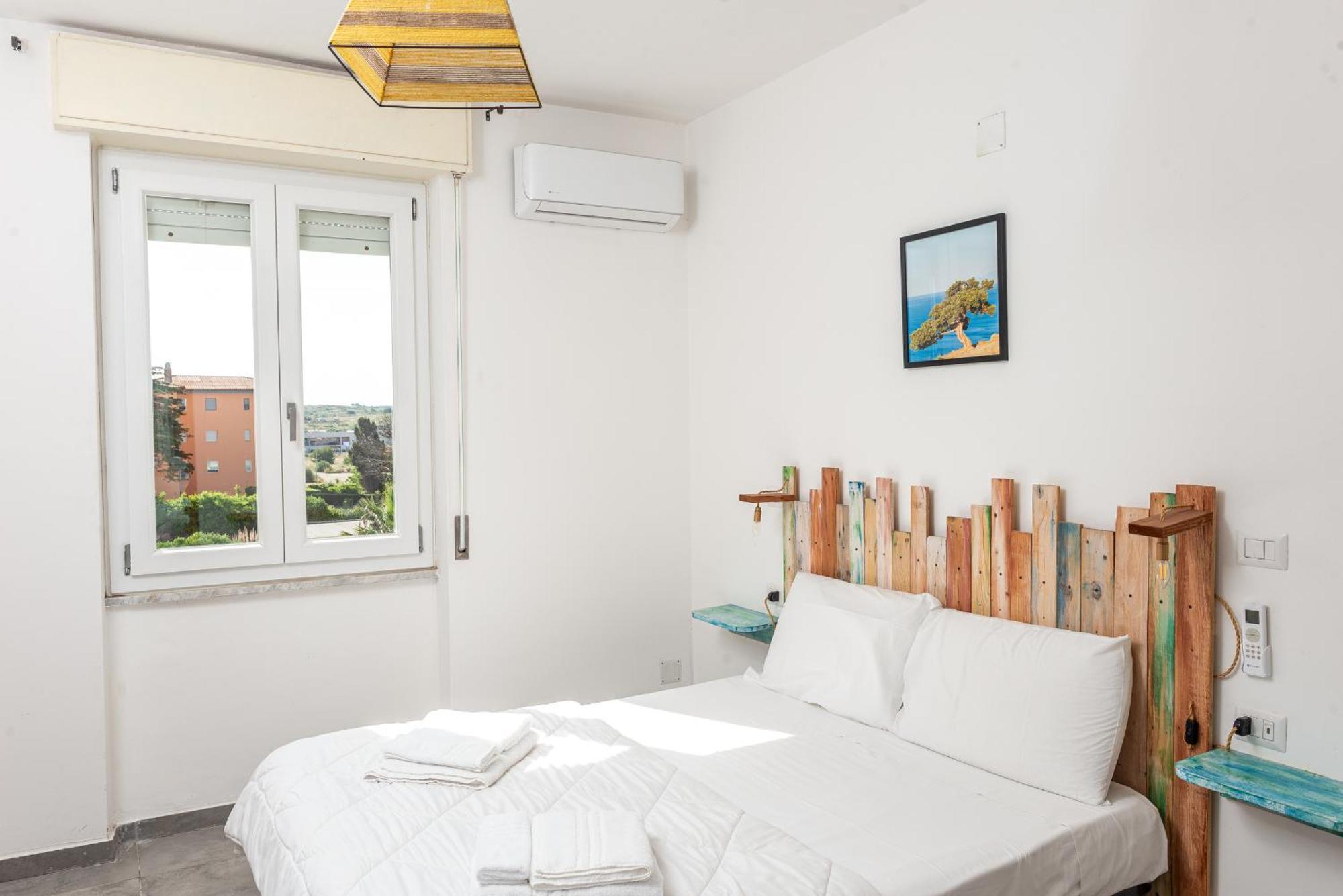 Guest House - Affittacamere Green Apartment - By Faendho Porto Torres Εξωτερικό φωτογραφία