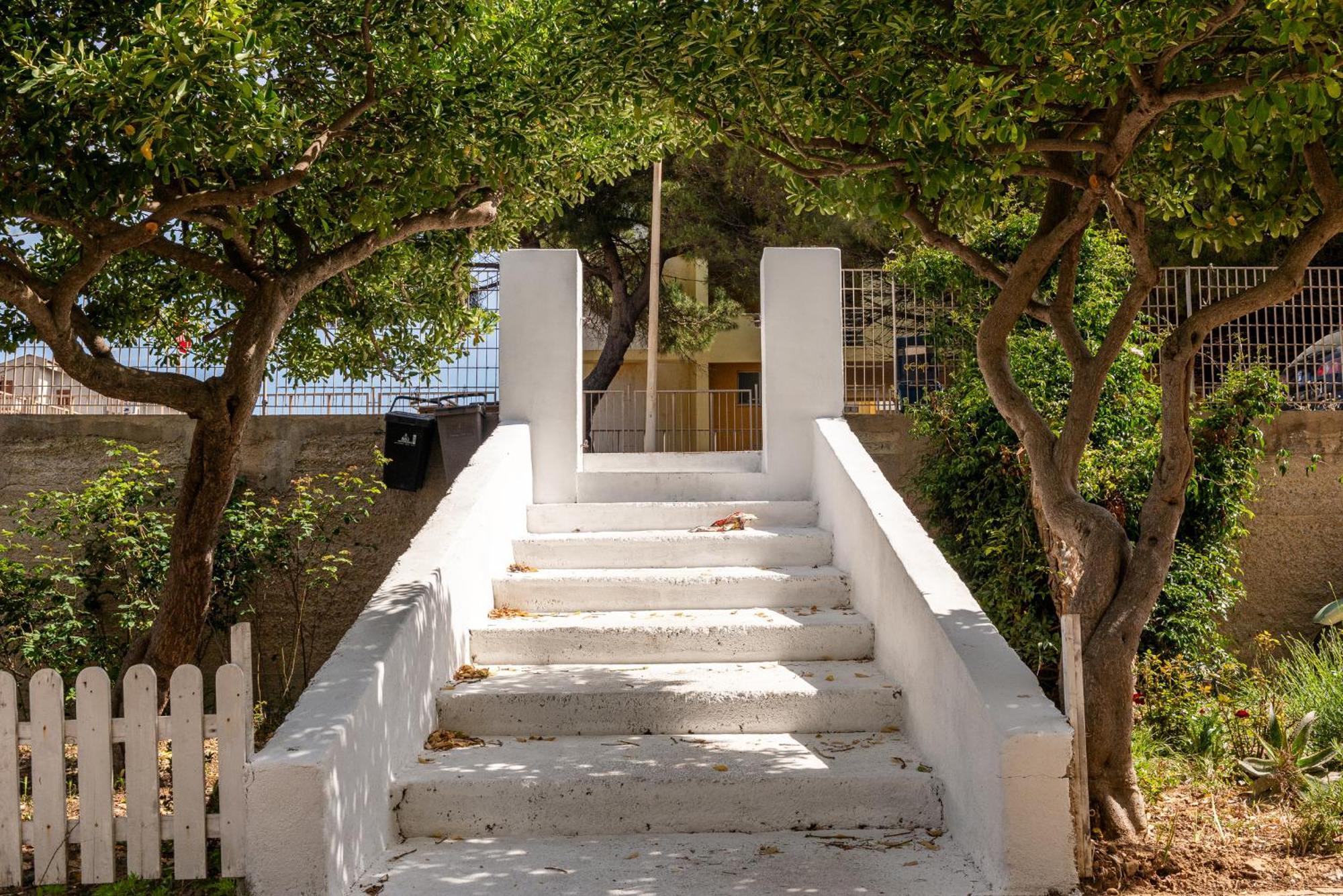 Guest House - Affittacamere Green Apartment - By Faendho Porto Torres Εξωτερικό φωτογραφία