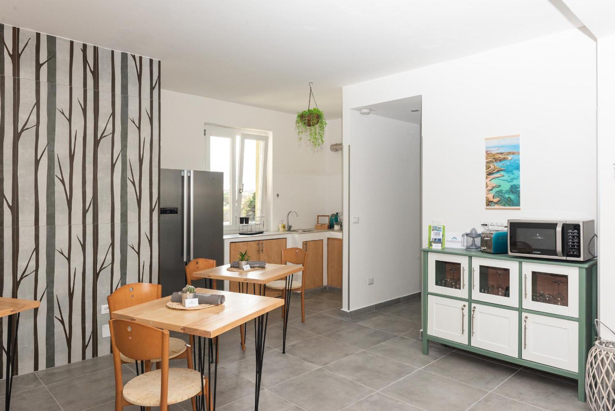 Guest House - Affittacamere Green Apartment - By Faendho Porto Torres Εξωτερικό φωτογραφία