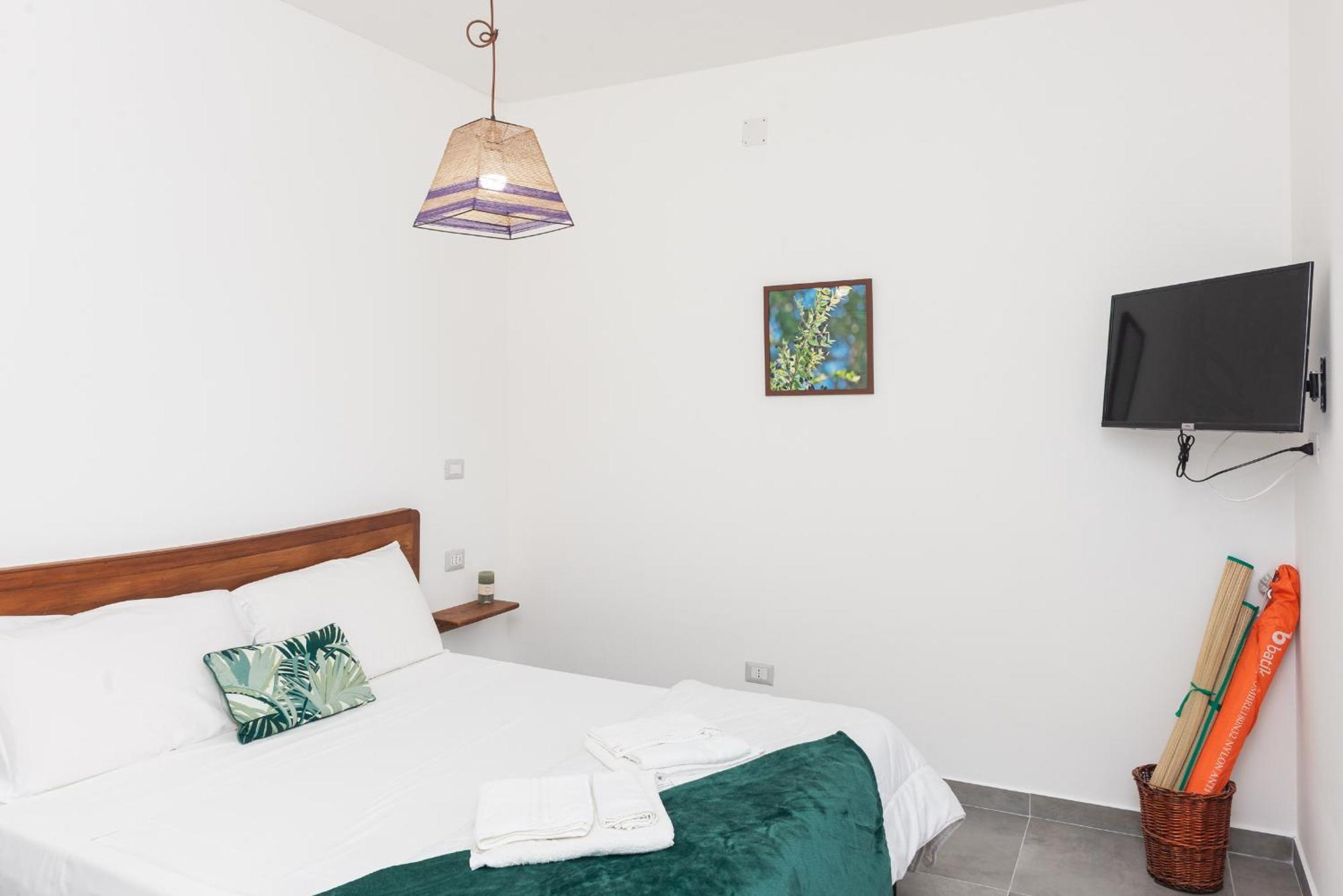 Guest House - Affittacamere Green Apartment - By Faendho Porto Torres Εξωτερικό φωτογραφία