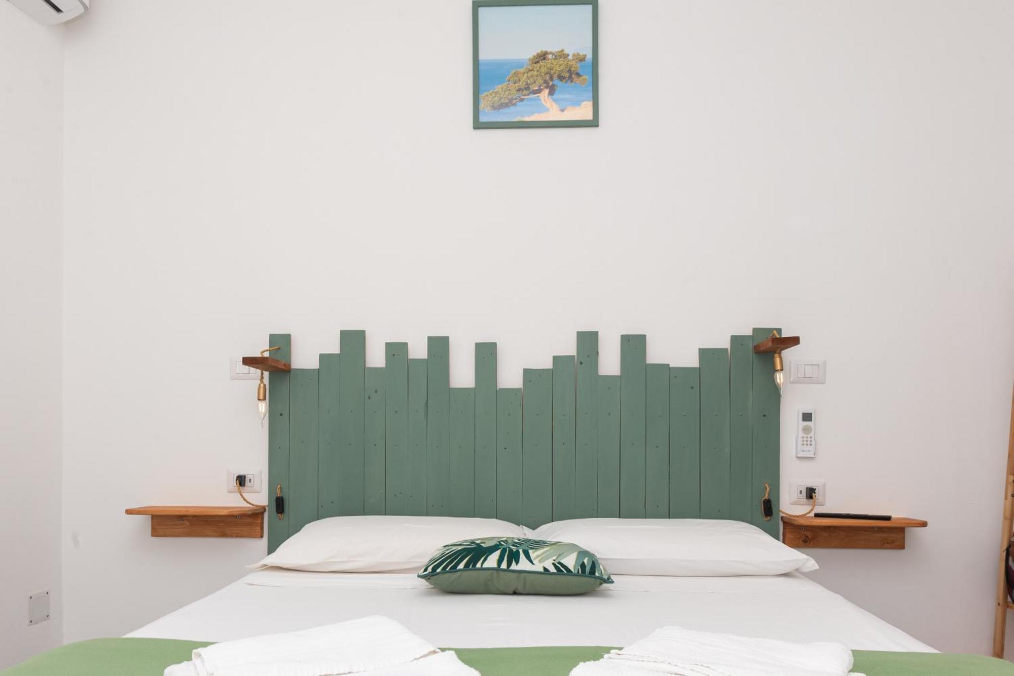 Guest House - Affittacamere Green Apartment - By Faendho Porto Torres Εξωτερικό φωτογραφία